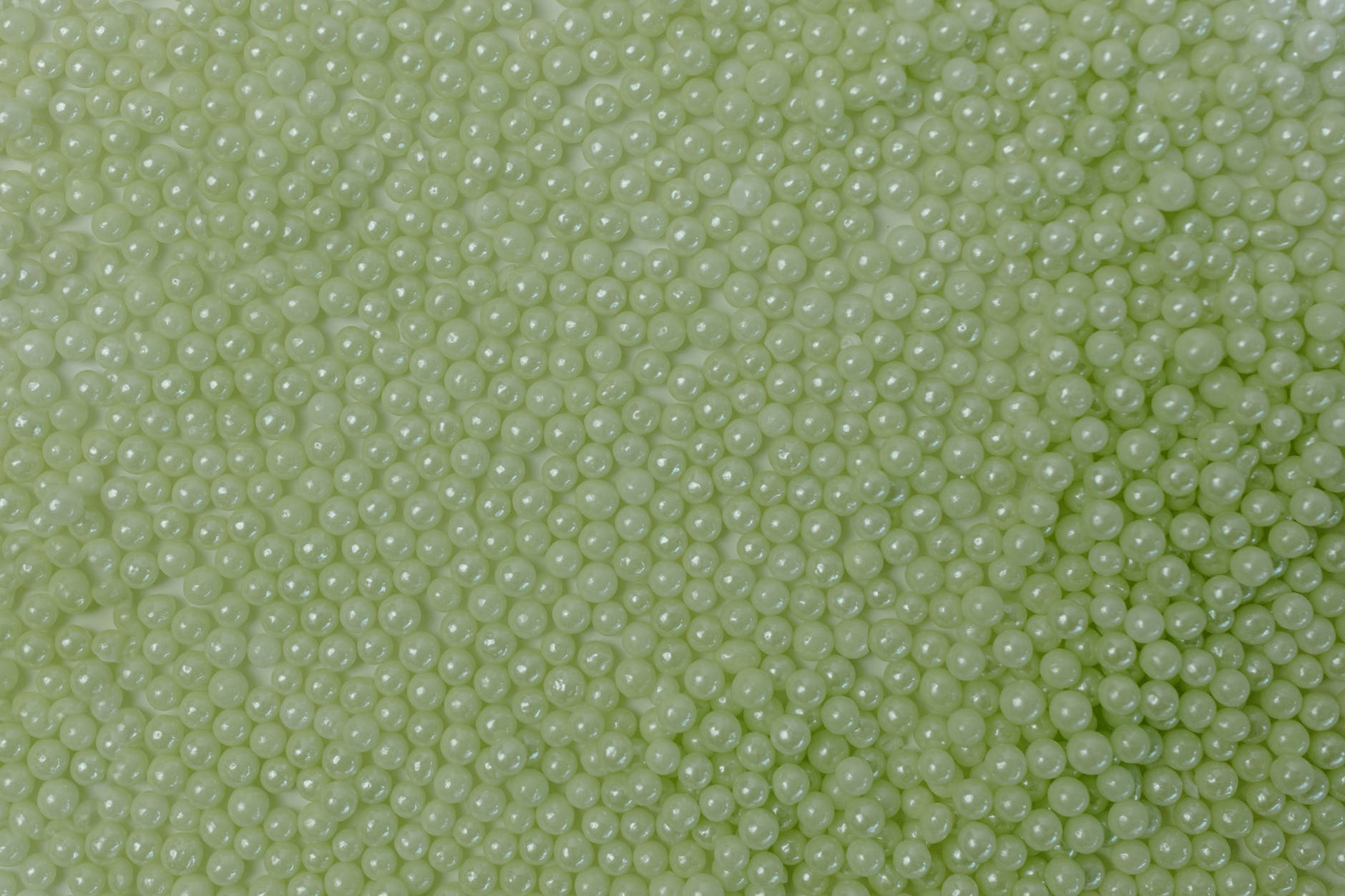 green candies in close up photography
